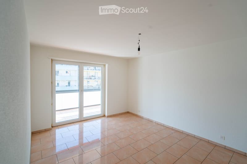 empty room, sliding glass door, balcony, tiled floor, white walls