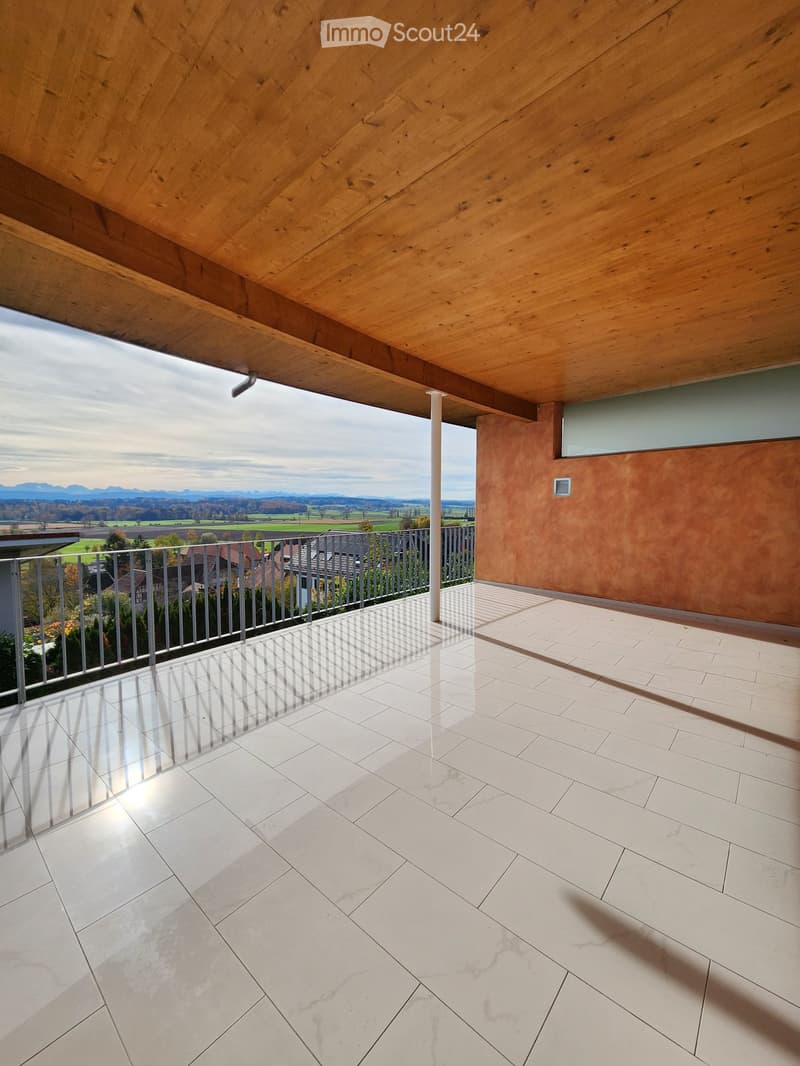 wooden ceiling, white tile flooring, large railings, view of mountains