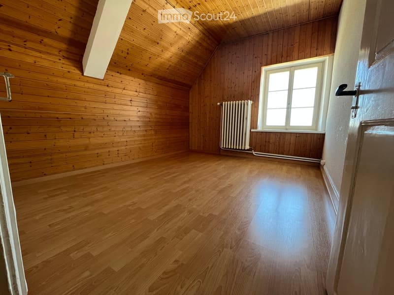 empty room, wooden walls, wooden floor, white radiator, window