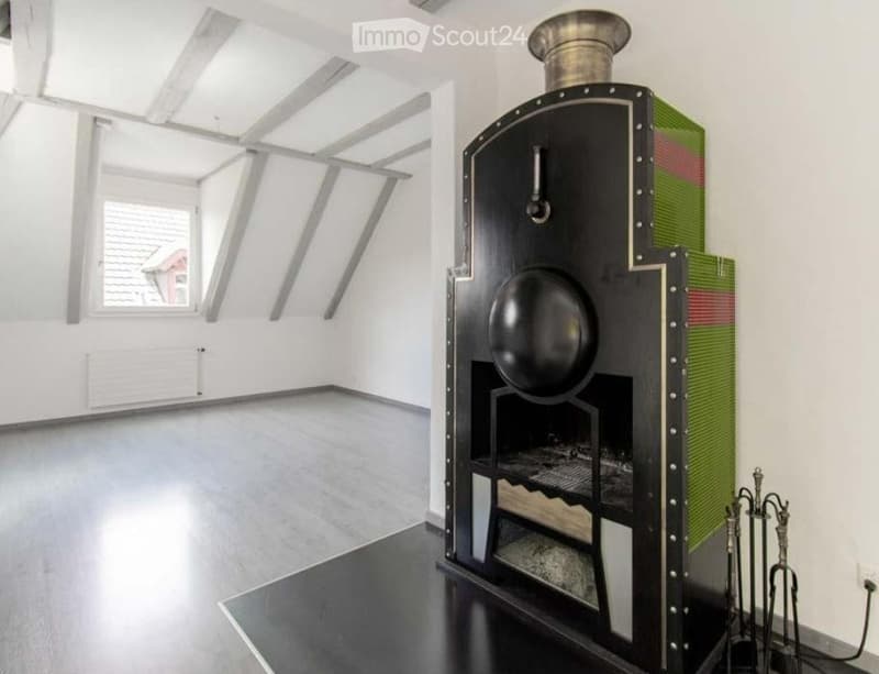 empty room, fireplace, wooden floor, white walls, window, radiator