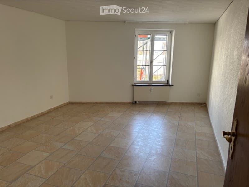 empty room, tiled floor, white walls, window, radiator