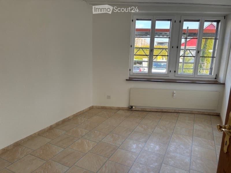 empty room, white walls, tiled floor, window, radiator
