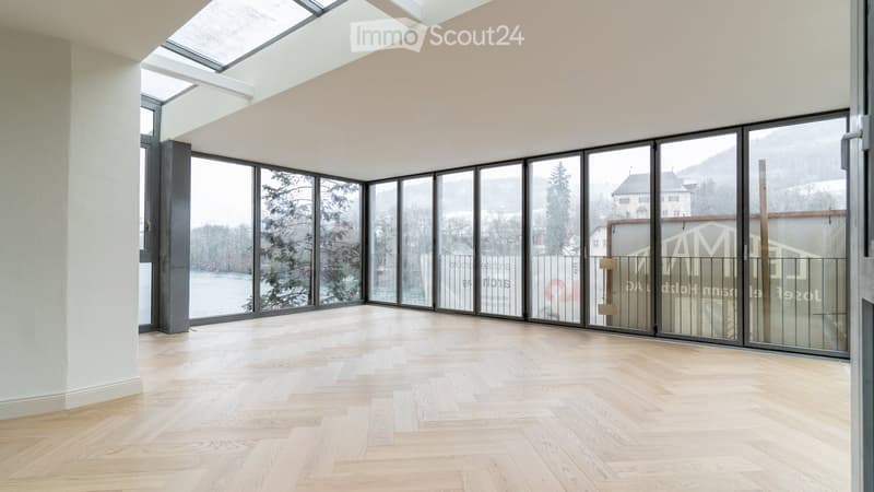 large windows, balcony, wooden floor, white walls, glass doors