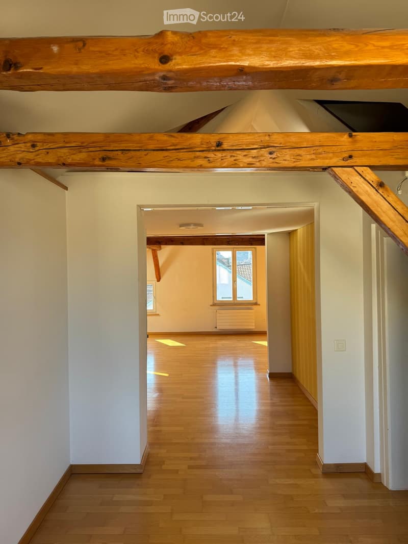 wooden beams, wooden floors, white walls, window, hallway
