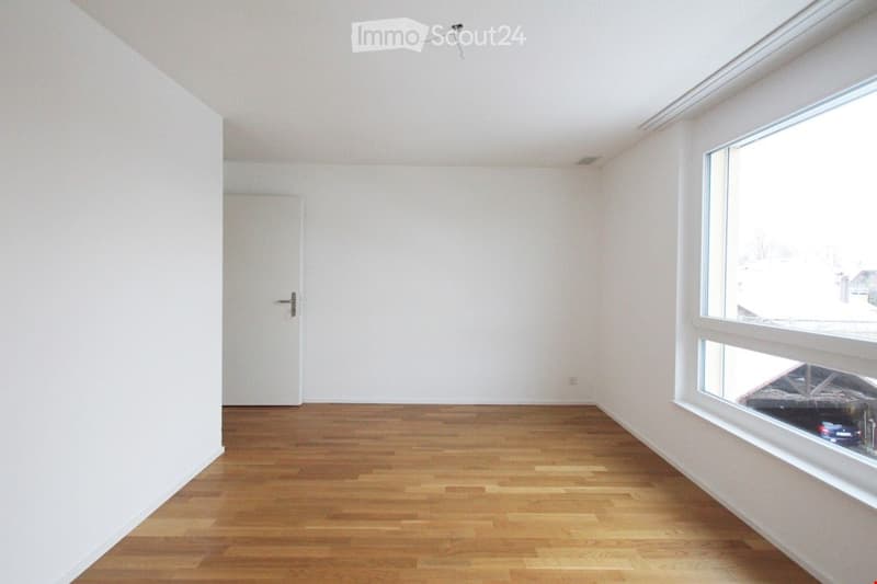 empty room, white walls, wooden floor, large window, door