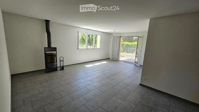 empty room, fireplace, sliding doors, windows, tiled floor