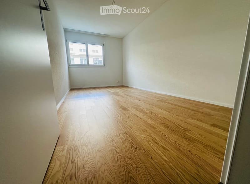 empty room, hardwood floors, white walls, window