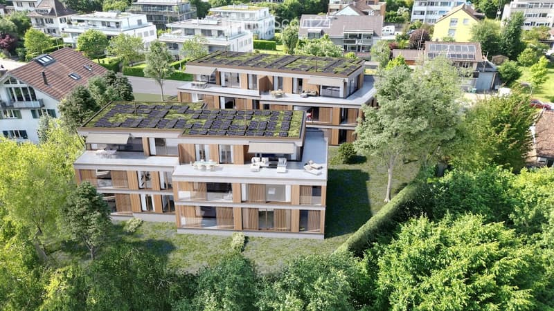 3-storey modern apartment buildings with solar panels, wooden balconies, and landscaped surroundings