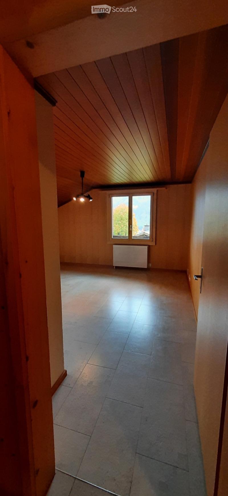 empty room, wooden ceiling, white tiled floor, window, radiator