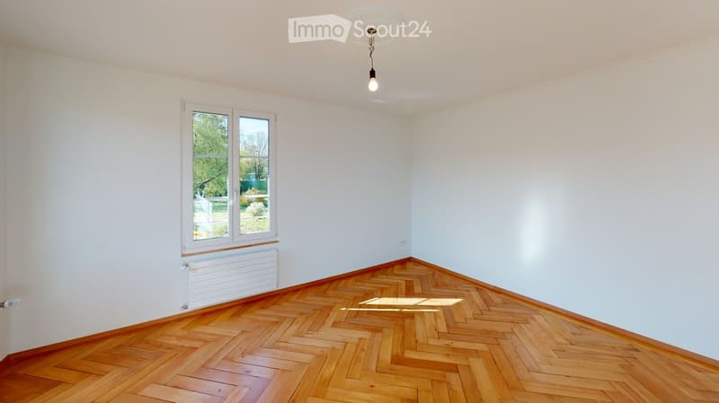 empty room, white walls, wooden floor, window, radiator