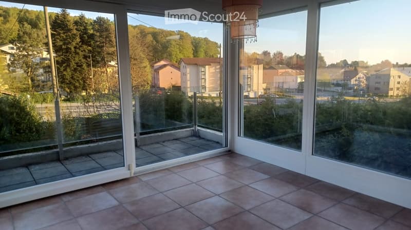 large windows, tiled floor, chandelier, empty room