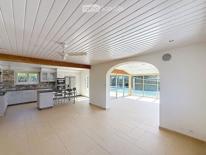 Open kitchen, dining area, living room, swimming pool, large windows