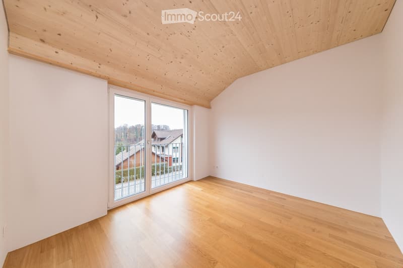 empty room, wooden floor, white walls, sliding glass doors, balcony