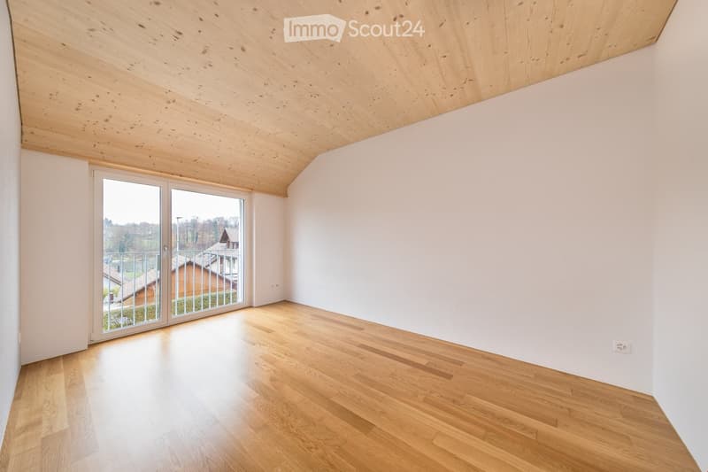 empty room, wooden floor, white walls, glass sliding doors, balcony