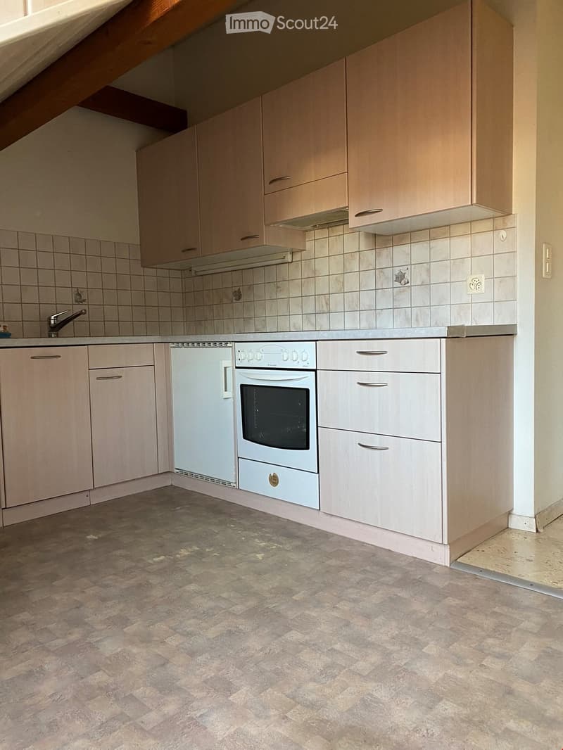 kitchen with a sink, dishwasher, and oven.