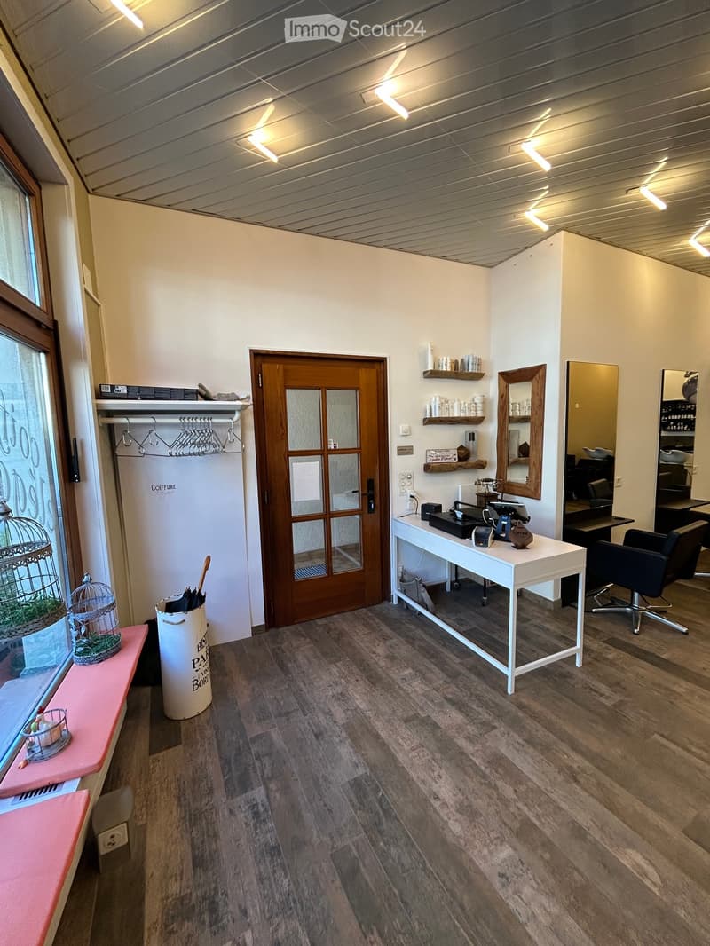 {"visible_features": [], "type": "Furnished Room", "objects": ["desk", "chair", "mirror", "umbrella stand", "coat rack", "shelves", "basket", "plant", "basket", "plant", "basket", "plant", "basket", "plant", "basket", "plant", "basket", "plant", "basket",