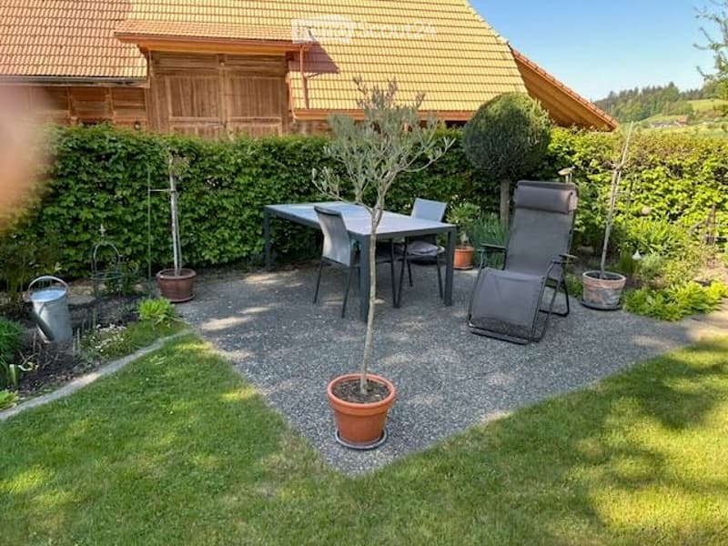 {"visible_features": [], "type": "Garden / Outdoor Area", "objects": ["table", "chairs", "planter", "planter", "planter", "planter", "planter", "planter", "planter", "planter", "planter", "planter", "planter", "planter", "planter", "planter", "planter", "