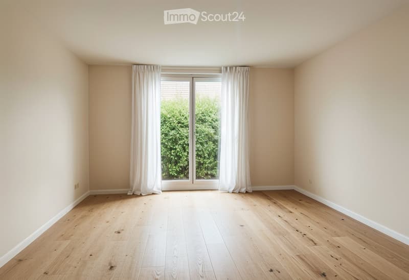 Empty room with wooden floor, white walls, large glass doors, white curtains, view of greenery outside