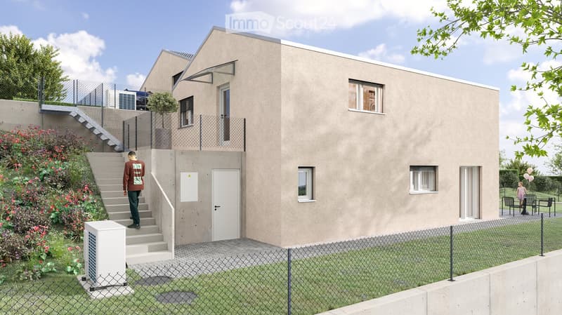 A modern two-story house with a beige exterior, featuring a staircase leading to the entrance, a small garden with flowers, and a balcony with a washing machine.