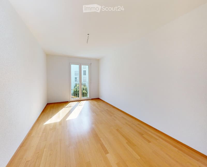 empty room, wooden floor, sliding glass doors, balcony outside