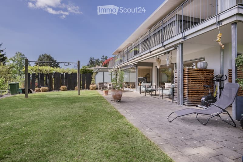 {"visible_features": ["Balcony / Terrace"], "type": "Garden / Outdoor Area", "objects": ["chair", "table", "planter", "swing", "exercise bike", "chair", "chair", "table", "chair", "chair", "chair", "chair", "chair", "chair", "chair", "chair", "chair", "ch