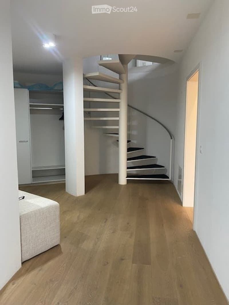 Contemporary staircase, Wooden flooring, white walls, minimalistic design, built-in wardrobe