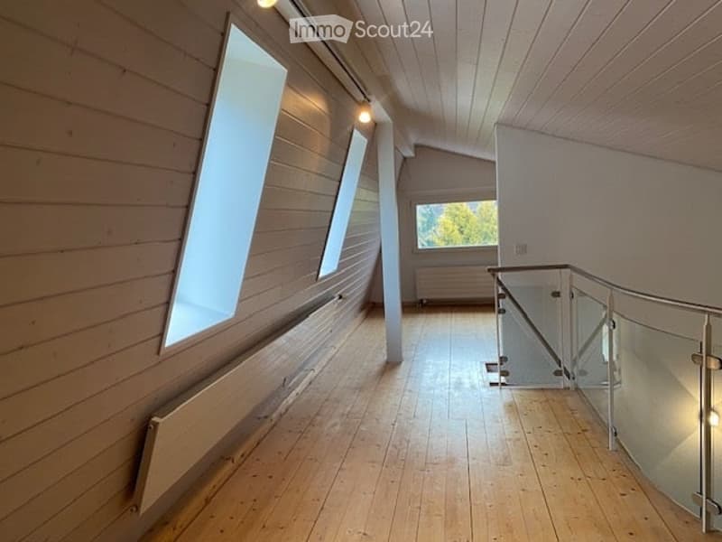 empty room, wooden floor, glass windows, glass railings, wooden walls
