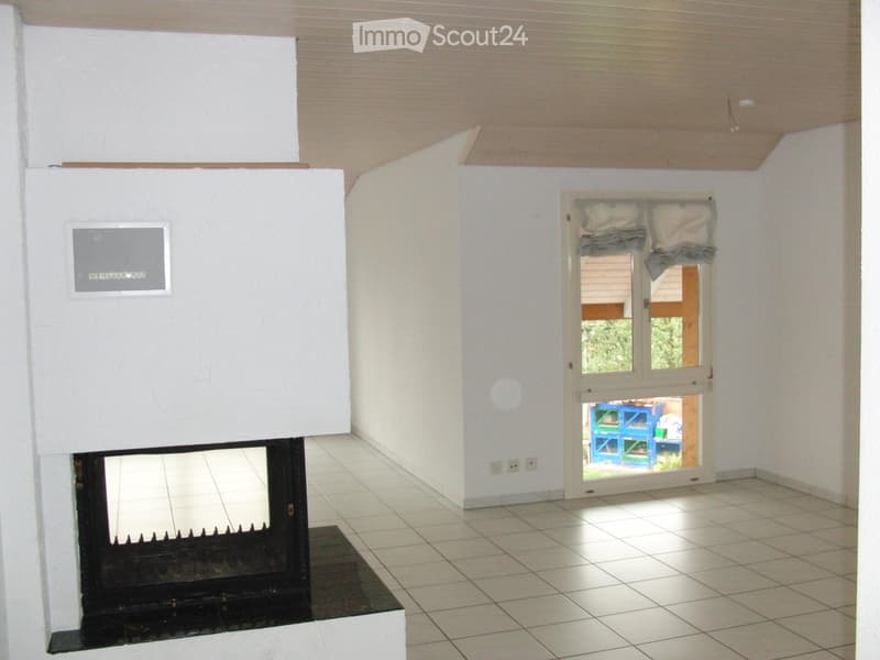 tiled floor, white walls, open door, fireplace, outlet
