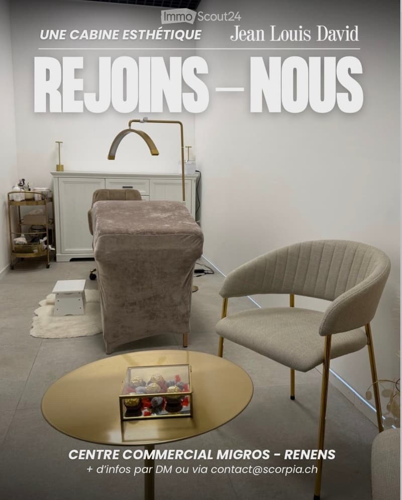 Furnished Room. A modern, well-furnished room with a beige sofa, a gold-framed chair, a round gold table with a decorative box, a white cabinet, and a floor lamp.