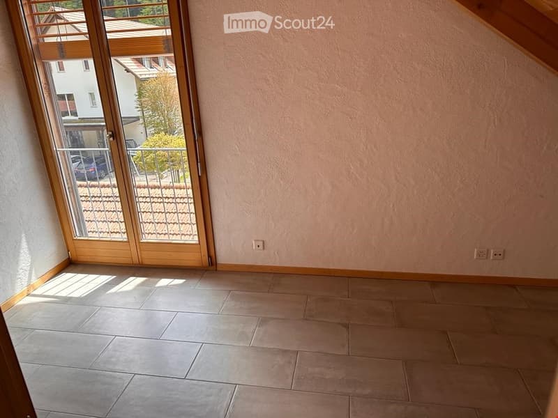 Unfurnished Room. Empty room with tiled floor, light-colored walls, and a large sliding glass door leading to a balcony or terrace.