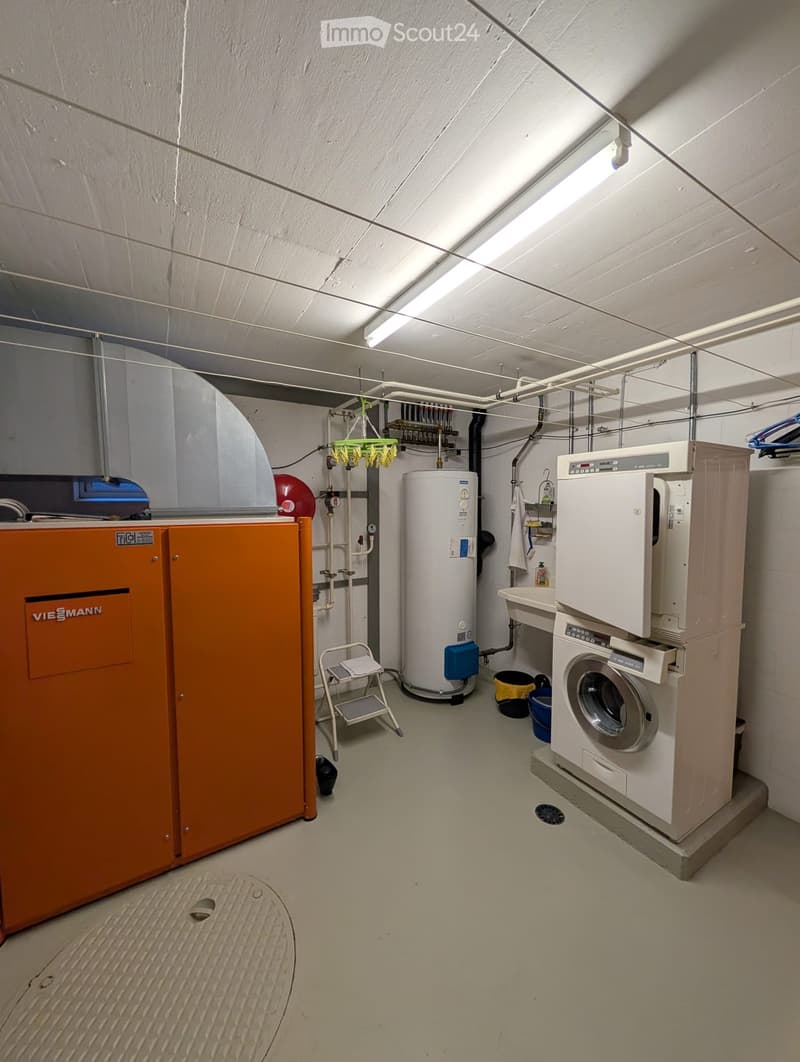 Laundry room with washing machine and dishwasher
