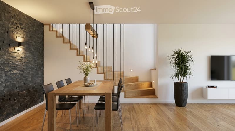 Modern dining area with a wooden dining table, black chairs, a potted plant, a television mounted on the wall, and a white cabinet. The space features a wooden staircase with modern lighting and a textured dark wall.