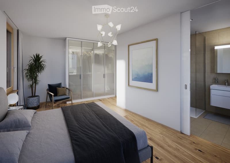 A modern bedroom with a double bed, bedside lamps, a large potted plant, a wardrobe with glass doors, a chair, a chandelier, a picture frame, and a white bathroom.