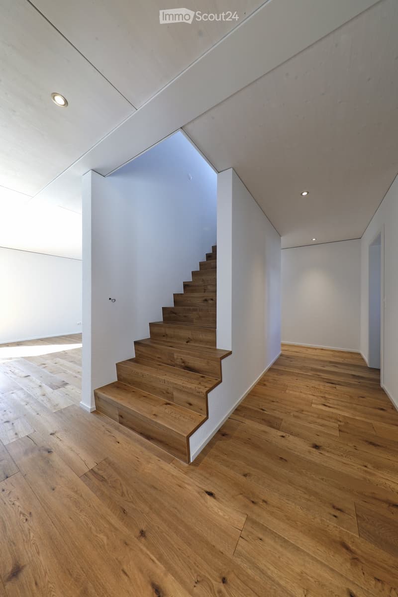 wooden stairs, white walls, wooden floor