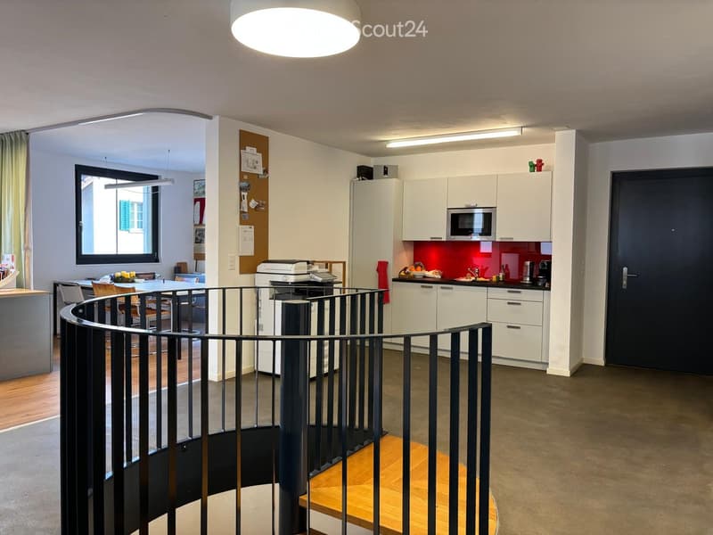 modern kitchen with integrated appliances, spiral staircase, printer, open floor plan, dining area, window with curtain