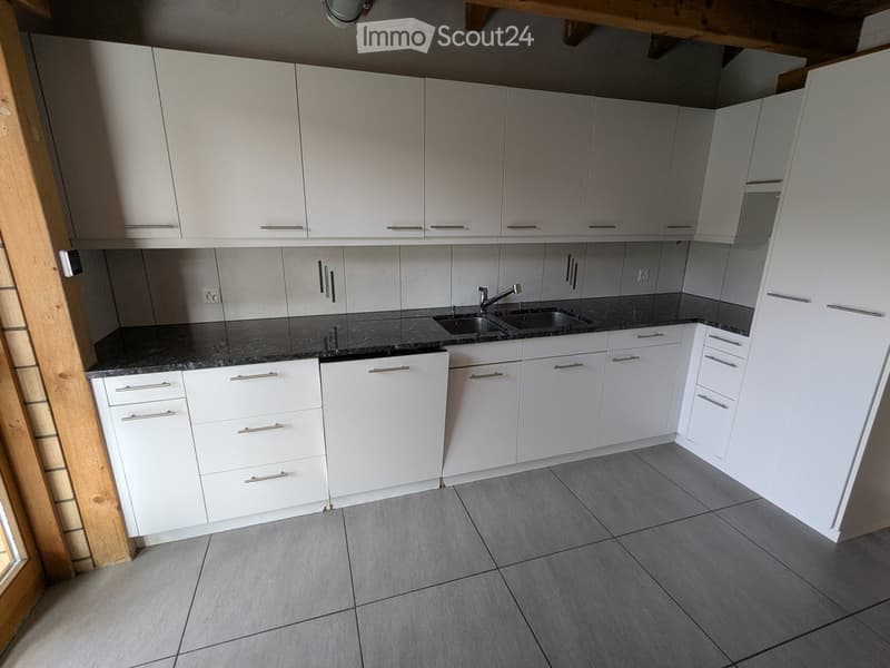 fully equipped kitchen, white cabinets, marble countertop, dishwasher, faucet