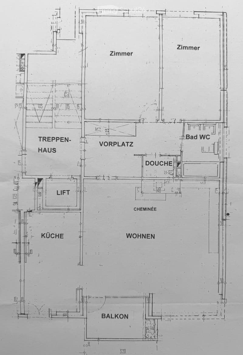 Floor plan showing a multi-room layout including a kitchen, living area, bedroom, bathroom, shower, hallway, staircase, and balcony.