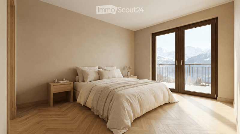 Modern bedroom with wooden flooring, large bed, nightstand, and scenic mountain view through large windows.