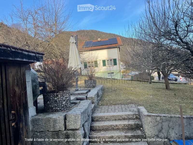 House, stone wall, solar panels, stone steps, mountain view