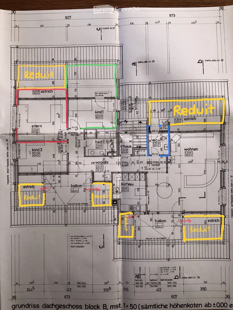 Floor plan of a multi-story building showing rooms labeled: living room, kitchen, two bedrooms, two bathrooms, balcony, and entrance.