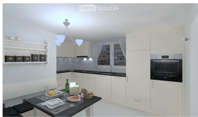 Modern kitchen with white cabinets, black countertops, a central island, and a dining area. Features include a chandelier, built-in oven, and decorative items on shelves.