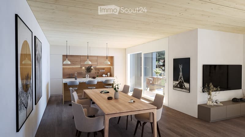 Furnished Room. Open-plan living and dining area with a wooden dining table, modern chairs, a kitchen island with pendant lights, and a large television on the wall.