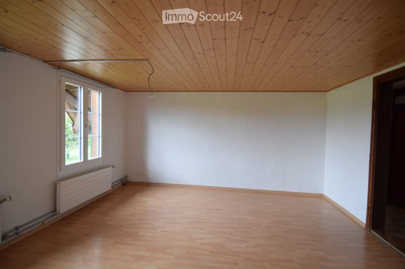 empty room, wooden floor, white walls, wooden ceiling, window, radiator