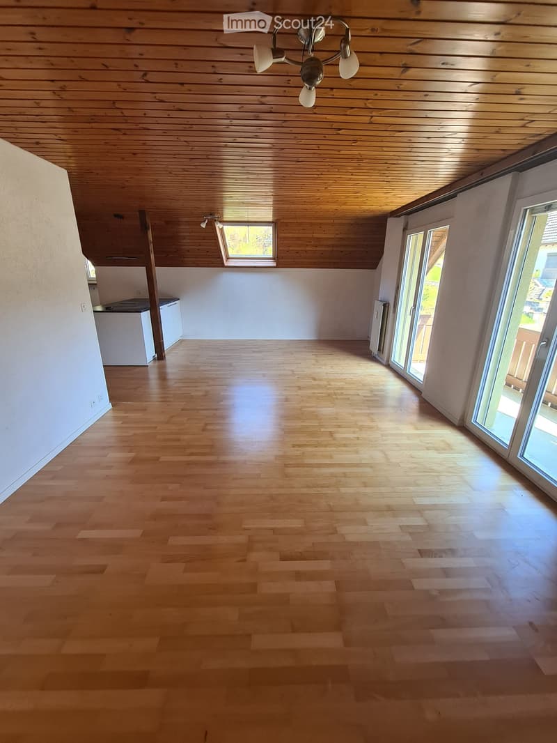 empty room, wooden floor, wooden ceiling, sliding glass doors, balcony, kitchen area