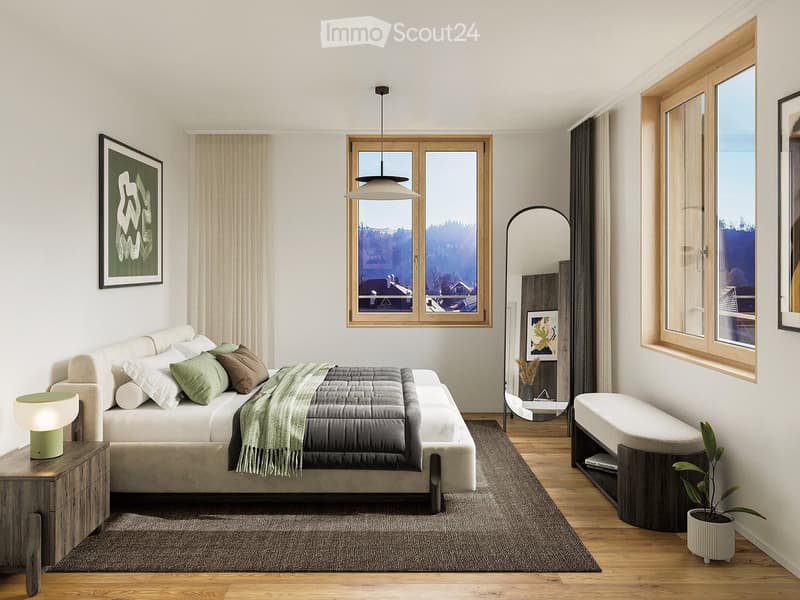 Modern bedroom with a large bed, nightstand, lamp, bench, mirror, potted plant, and artwork on the walls.