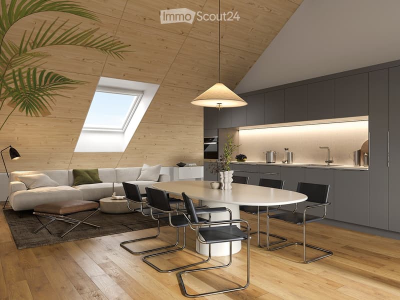 Modern living and dining area with a grey sectional sofa, white coffee table, round dining table with six chairs, grey kitchen cabinets, and a hanging lamp.