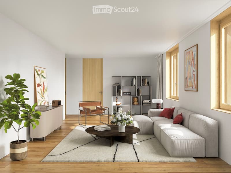 Modern living room with white walls, wooden flooring, large windows, a sectional sofa, coffee table, armchair, bookshelf, and decorative plant.