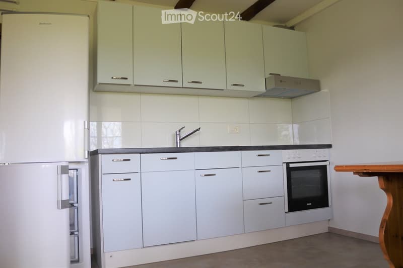 white cabinets, gas range, dishwasher, oven, sink, faucet, refrigerator