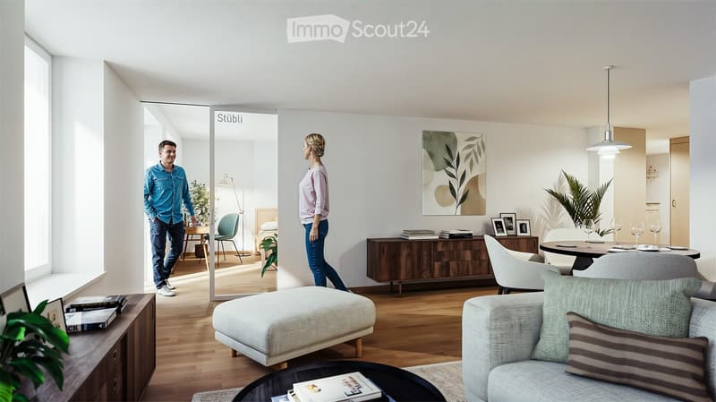 Modern living room with light-colored furniture, large windows, and a spacious layout. Features include a sofa, coffee table, dining area with chairs and table, a cabinet, and decorative artwork.