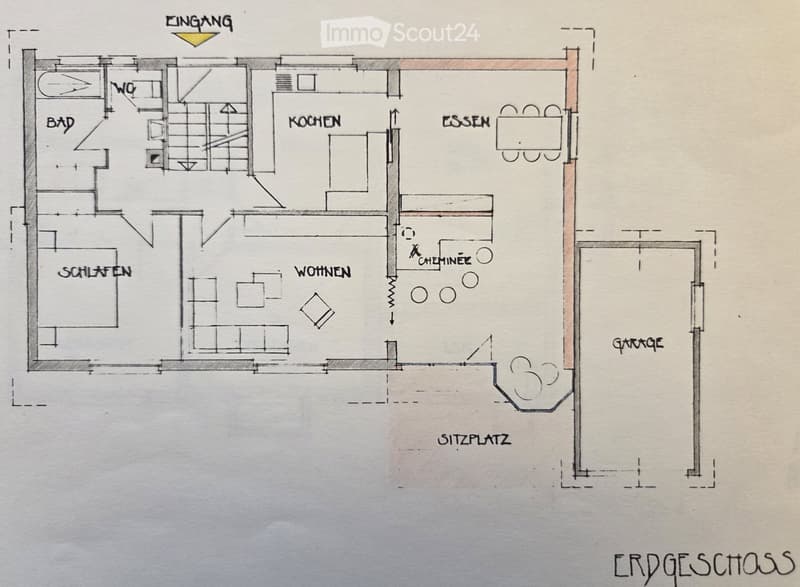 Floor plan of a ground floor showing a bathroom, kitchen, dining area, living room, bedroom, and garage.